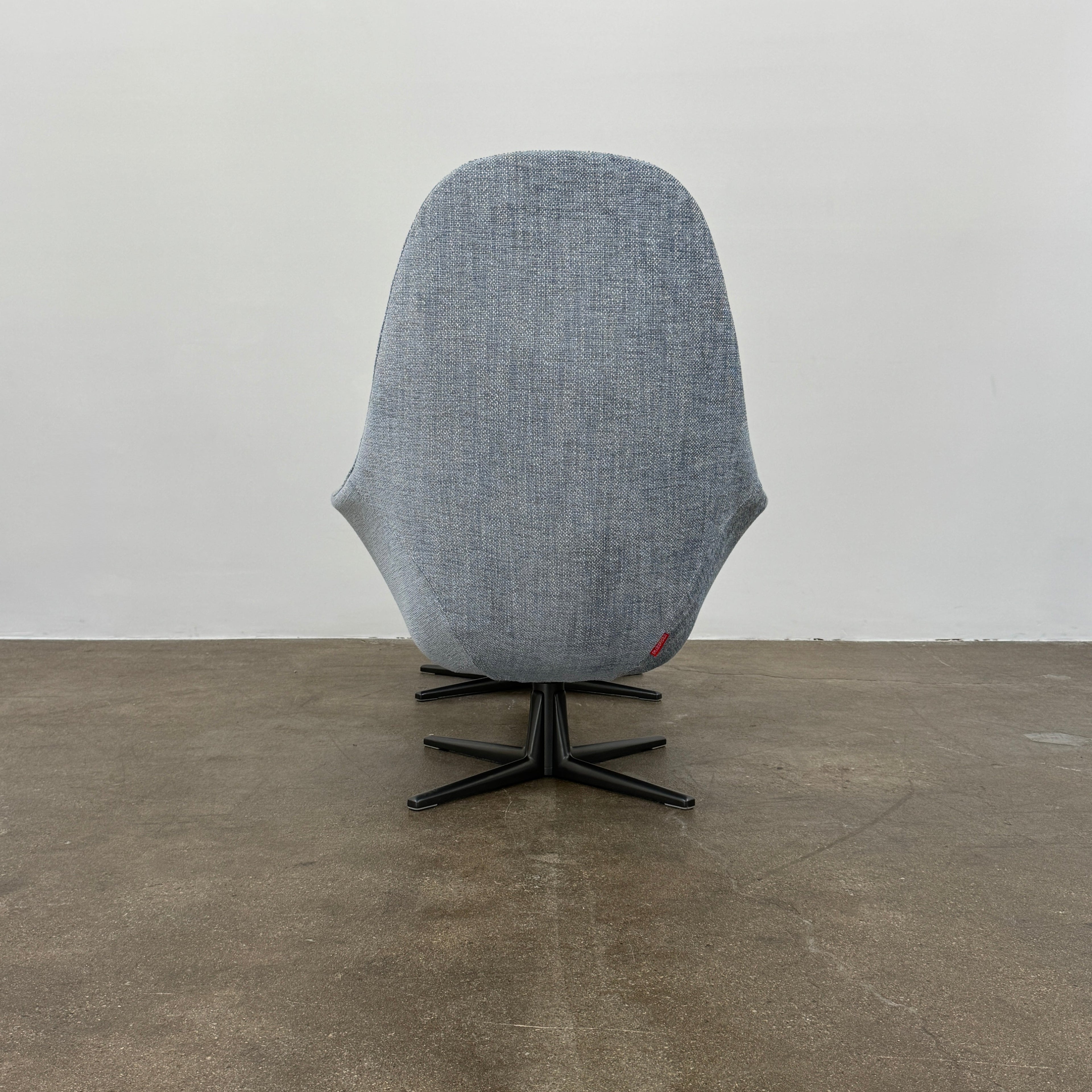 Fauteuil pivotant et pouf Poliform Marlon (2 housses disponibles)