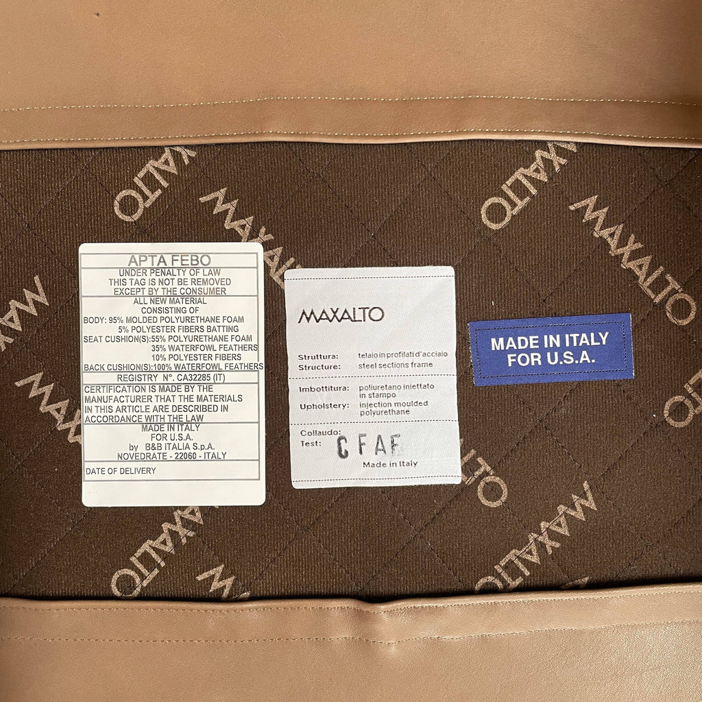 Fauteuil à dossier haut et pouf Maxalto Febo