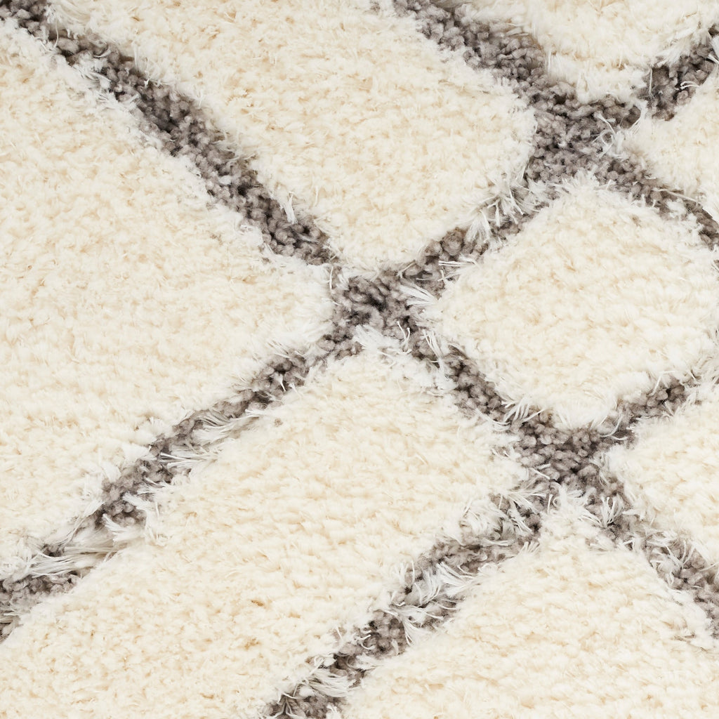 Tapis Nourison luxueux à poils longs et ultra moelleux, motif géométrique abstrait