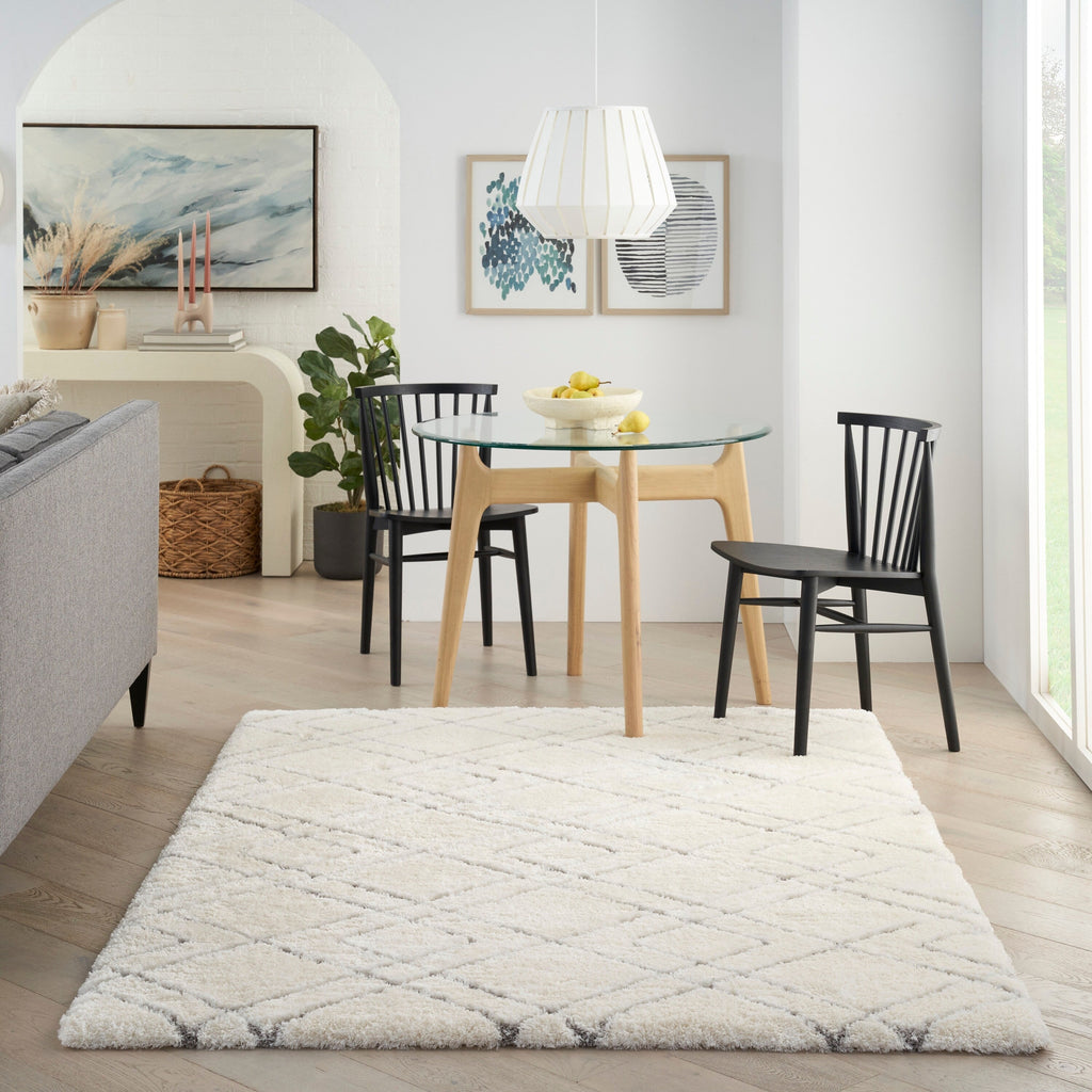 Tapis Nourison luxueux à poils longs et ultra moelleux, motif géométrique abstrait