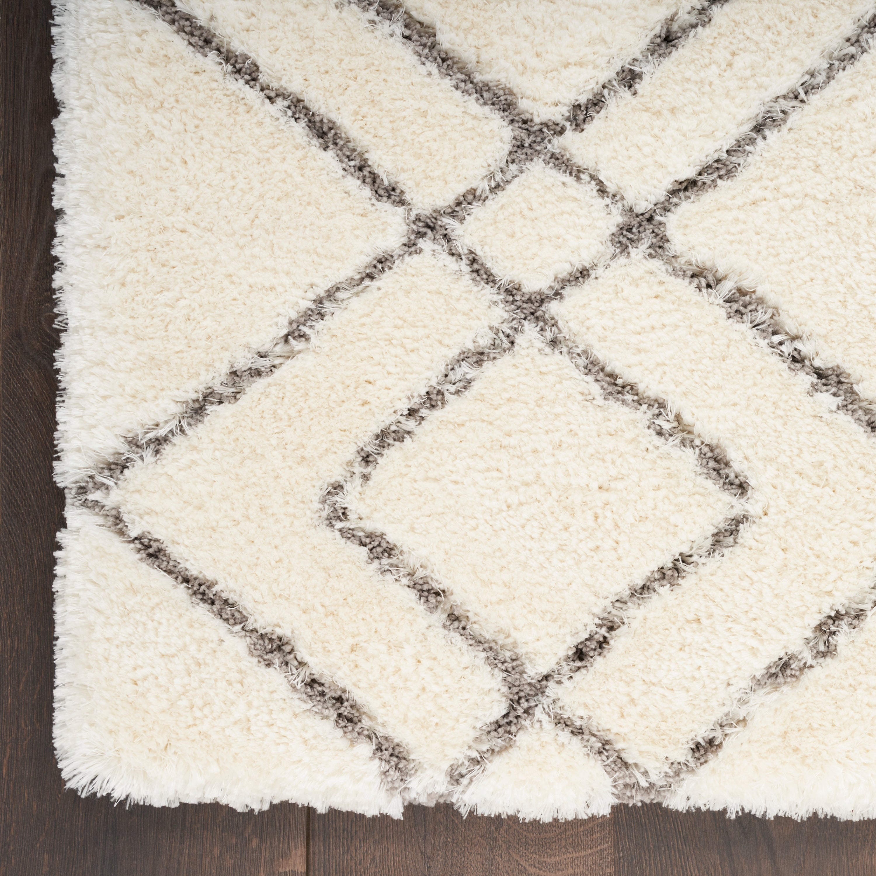 Tapis Nourison luxueux à poils longs et ultra moelleux, motif géométrique abstrait