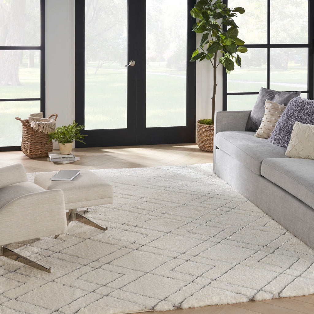 Tapis Nourison luxueux à poils longs et ultra moelleux, motif géométrique abstrait