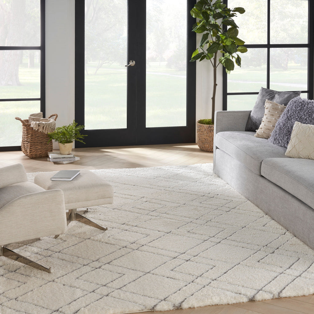 Tapis Nourison luxueux à poils longs et ultra moelleux, motif géométrique abstrait