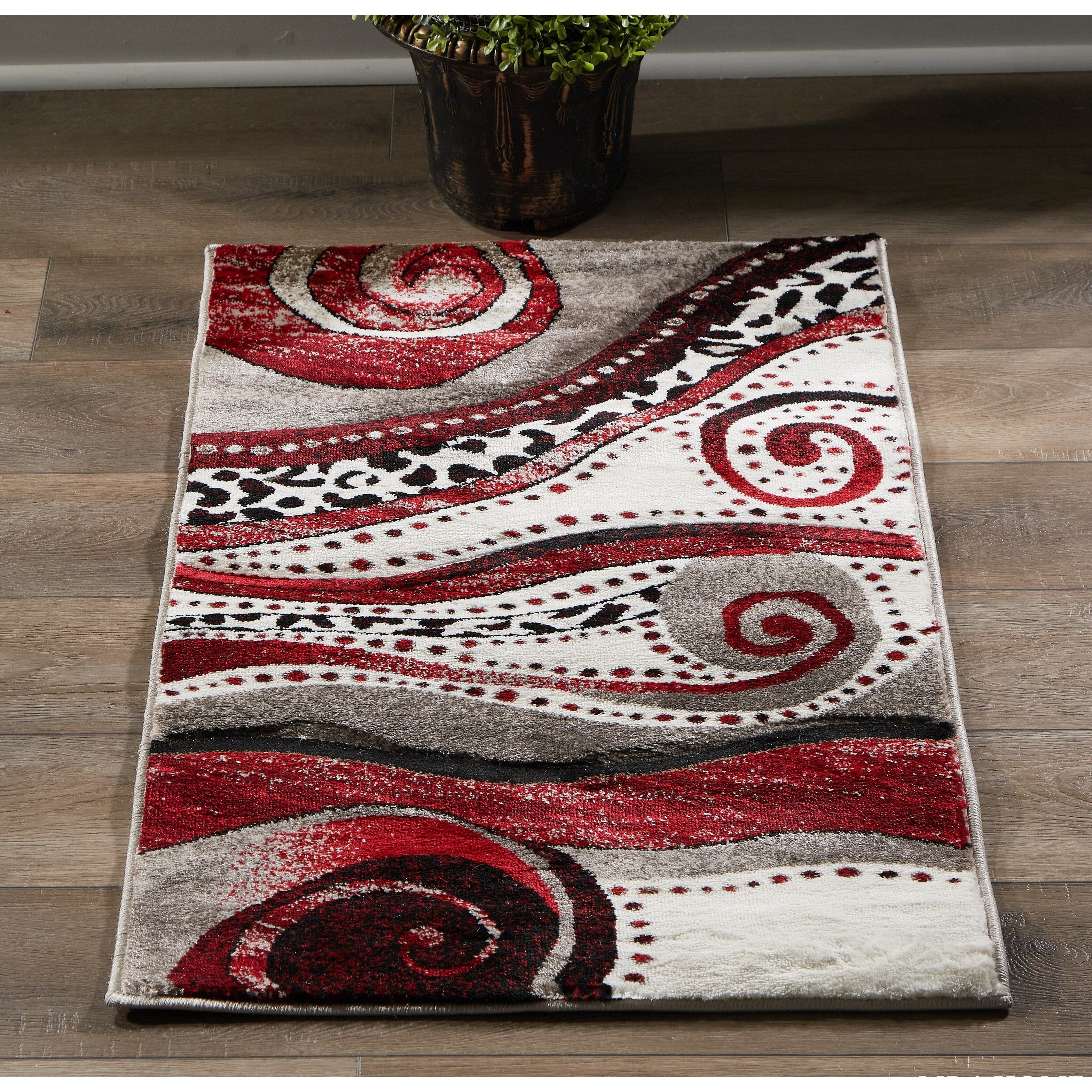 Tapis à tourbillons abstraits de la collection Rhodes