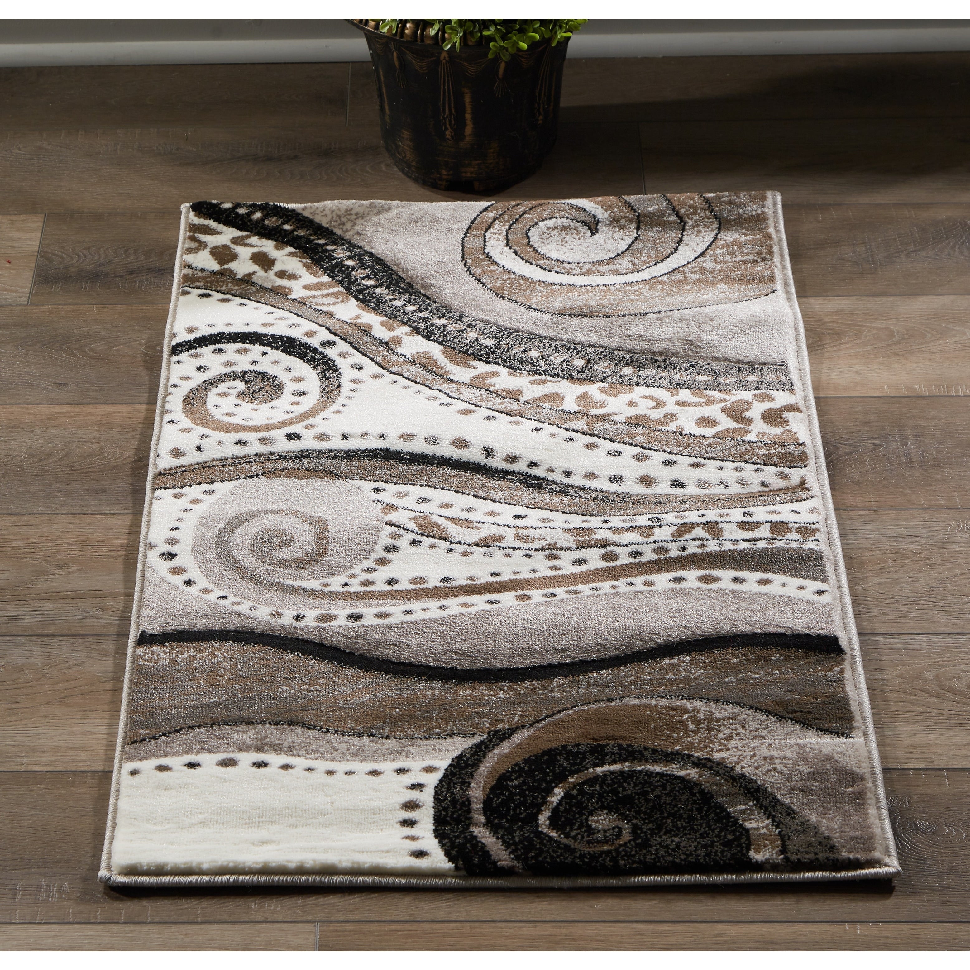 Tapis à tourbillons abstraits de la collection Rhodes